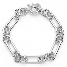 Load image into Gallery viewer, Lagos Sterling Silver and 18K Yellow Gold Caviar Fluted Oval Link Toggle Bracelet