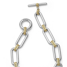Load image into Gallery viewer, Lagos Sterling Silver and 18K Yellow Gold Caviar Fluted Two-Tone Link Toggle Bracelet