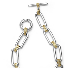 Load image into Gallery viewer, Lagos Sterling Silver and 18K Yellow Gold Caviar Fluted Two-Tone Link Toggle Bracelet
